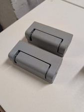 Cerniera reversibile per porta